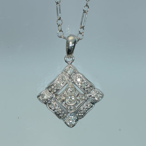 White Gold Pendant With 1/4 Carat Total of White Diamonds