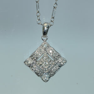 White Gold Pendant With 1/4 Carat Total of White Diamonds