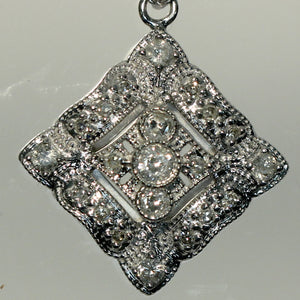 White Gold Pendant With 1/4 Carat Total of White Diamonds