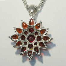 Garnet Sunburst Pendant in Sterling Silver