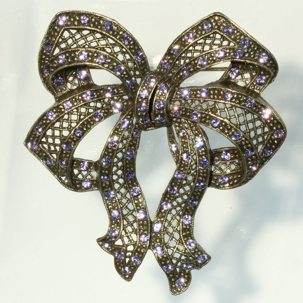 Large Gold-Tone Bow Pin in Antique Finish and Lavender Crystals