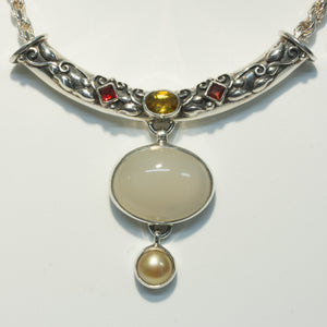 A Gemstone-Set Sterling Silver Sliding Pendant and Chain