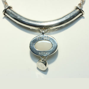 A Gemstone-Set Sterling Silver Sliding Pendant and Chain